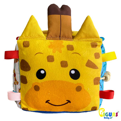 Un cubo sensorial para bebés con la cara de una cebra feliz, perfecto para estimular la atención de tu pequeño y ser su primer animalito.
